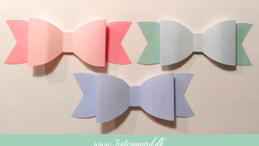 Gratis fold-selv sløjfe, hjemmelavet gavepynt, sløjfe til julegaver, sløjfe til fødselsdagsgaver, foldbar sløjfe til gaver, DIY sløjfe, gaveindpakning med sløjfe, kreativ gavepynt, nem sløjfe til mandelgave, print-selv sløjfe, pynt til julegaver og fødselsdage.